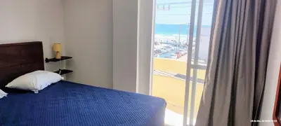 Uma cama ou camas num quarto em code 162 - Apartment Praia de Bombas - sea view