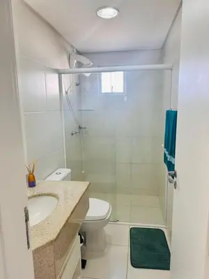 Uma casa de banho em Incrível Apartamento vista mar a poucos passos da praia com 3 dormitórios