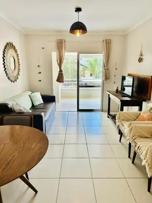 Uma área de estar em Incrível Apartamento vista mar a poucos passos da praia com 3 dormitórios