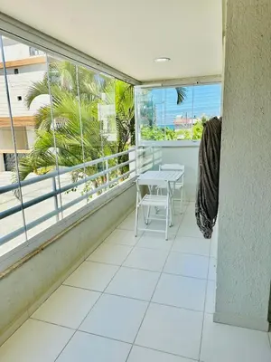 Uma varanda ou terraço em Incrível Apartamento vista mar a poucos passos da praia com 3 dormitórios
