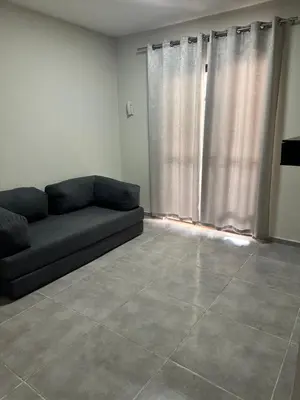Uma área de estar em Casa para aluguel de temporada