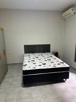 Uma cama ou camas num quarto em Casa para aluguel de temporada
