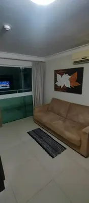 Uma área de estar em Bombinhas Summer Beach, piscina, sauna, pool