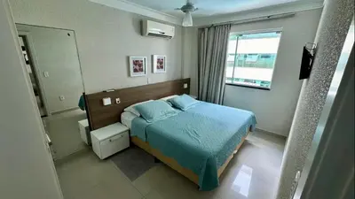 Uma cama ou camas num quarto em Bombinhas Summer Beach, piscina, sauna, pool