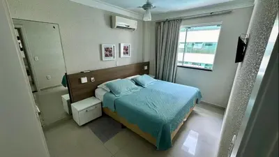 Uma cama ou camas num quarto em Bombinhas Summer Beach, piscina, sauna, pool