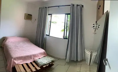 Uma cama ou camas num quarto em Casa Balneário, perto Barra Sul