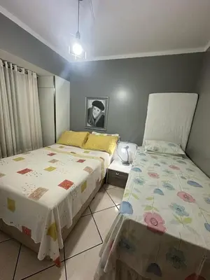 Uma cama ou camas num quarto em Apartamento aconchegante frente mar, na Meia Praia