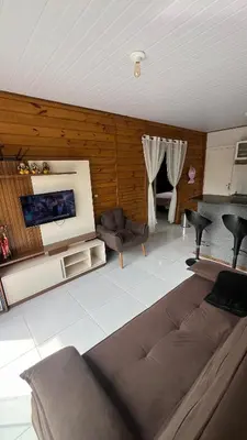 Uma área de estar em Marujos House