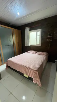 Uma cama ou camas num quarto em Marujos House