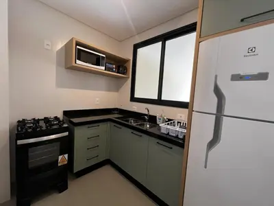 A cozinha ou kitchenette de Garden Duplex com Quintal em Mariscal