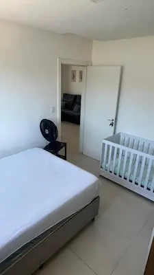 Uma cama ou camas num quarto em Ap Alto São Bento