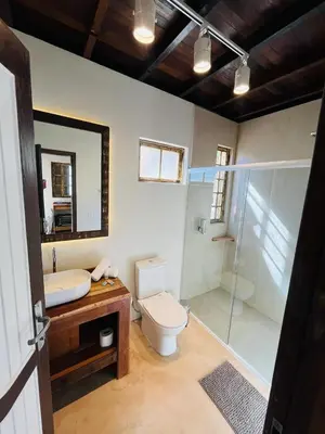 Uma casa de banho em Studio Na Natureza Com Hidro - Baoba Suites