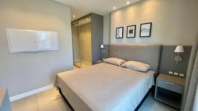 Uma cama ou camas num quarto em Flat com Vista Mar • Conforto e Lazer em Itapema