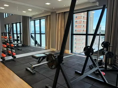O centro de fitness e/ou as comodidades de fitness de Flat com Vista Mar • Conforto e Lazer em Itapema
