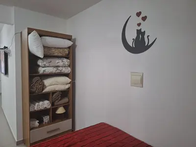 Uma cama ou camas num quarto em Studio Litorâneo para Relaxar