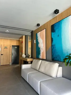 Uma área de estar em Flat Liv Exclusive