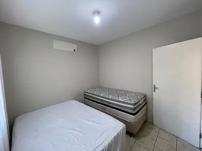 Uma cama ou camas num quarto em Casa para 9 Pessoas c Churrasqueira