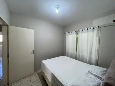 Uma cama ou camas num quarto em Casa para 9 Pessoas c Churrasqueira