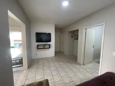 Uma televisão e/ou sistema de entretenimento em Casa para 9 Pessoas c Churrasqueira