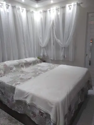 Uma cama ou camas num quarto em Casa Bela Vista