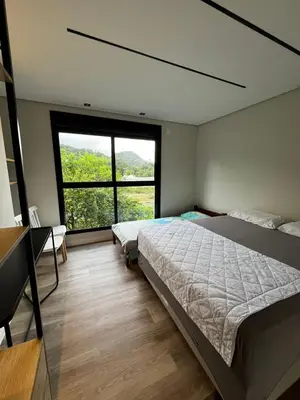 Uma cama ou camas num quarto em Balneário Camboriú - Praia do Estaleirinho perto Multiparque