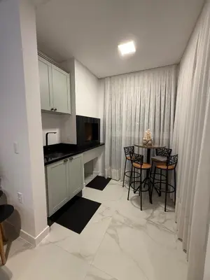 A cozinha ou kitchenette de Apartamento Pereque 300 metros da praia