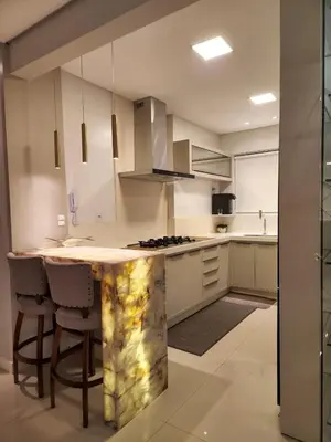A cozinha ou kitchenette de Apartamento, confortável e com ótima localização!