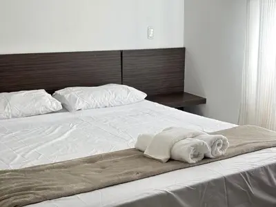 Uma cama ou camas num quarto em Cobertura Duplex Hidro, Churrasqueira e 4 Suítes