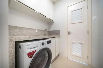A cozinha ou kitchenette de Apto de alto padrão a 450m da praia JM7729