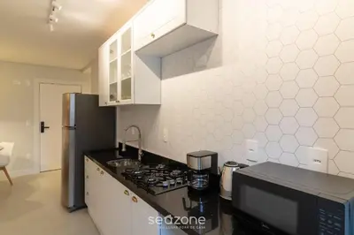 A cozinha ou kitchenette de Apto c/ Churrasqueira a 450 m da praia EVU1802