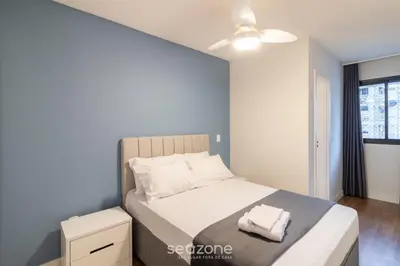 Uma cama ou camas num quarto em Apto c/ Churrasqueira a 450 m da praia EVU1802