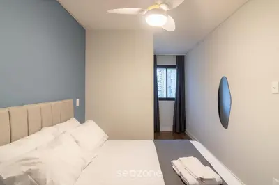 Uma cama ou camas num quarto em Apto c/ Churrasqueira a 450 m da praia EVU1802