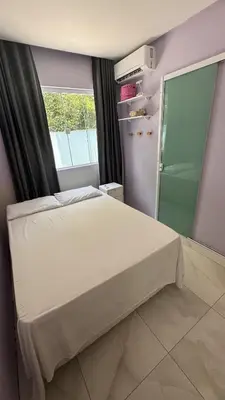 Uma cama ou camas num quarto em Casa na Praia Balneário Camboriú