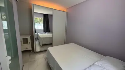 Uma cama ou camas num quarto em Casa na Praia Balneário Camboriú