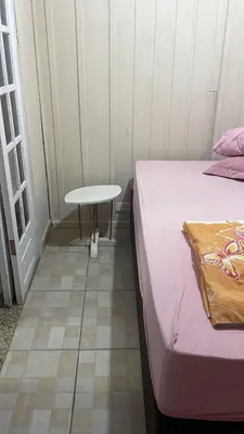 Uma cama ou camas num quarto em Casa de Temporada