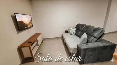 Uma área de estar em Residencial da Vila