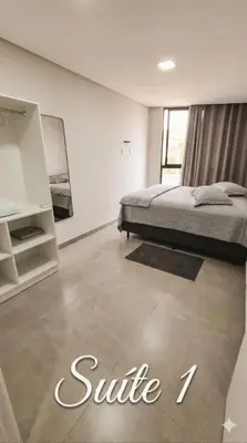 Uma cama ou camas num quarto em Residencial da Vila