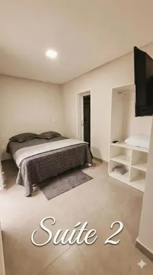 Uma cama ou camas num quarto em Residencial da Vila
