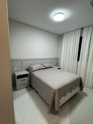 Uma cama ou camas num quarto em invictus praia de Palmas
