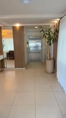 A área de receção ou átrio de PRAIA de BOMBAS AP 303 RESIDENCIAL BREEZE