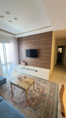 Uma televisão e/ou sistema de entretenimento em PRAIA de BOMBAS AP 303 RESIDENCIAL BREEZE