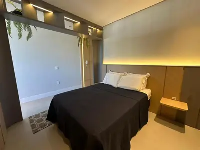 Uma cama ou camas num quarto em Jacuzzi e Piscina Aquecida • 120 m da Praia