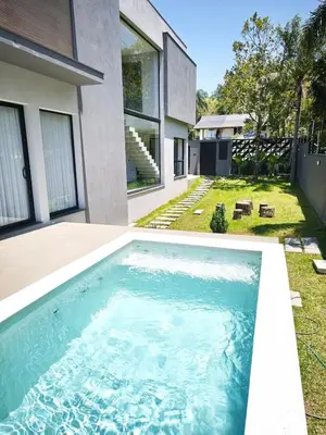 A piscina em ou perto de Casa Woods seu Refúgio na Praia do Estaleiro