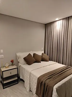 Uma cama ou camas num quarto em Casa Woods seu Refúgio na Praia do Estaleiro