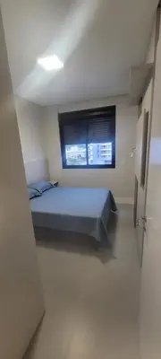 Uma cama ou camas num quarto em Apartamento praia de palmas