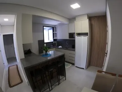 A cozinha ou kitchenette de Apartamento praia de palmas