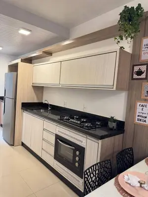 A planta de Apto Completo Premium com 2 quartos, garagem e Próximo as Praias!