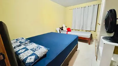 Uma cama ou camas num quarto em Casa com 3 Dormitórios em Zimbros