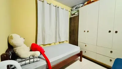 Uma cama ou camas num quarto em Casa com 3 Dormitórios em Zimbros