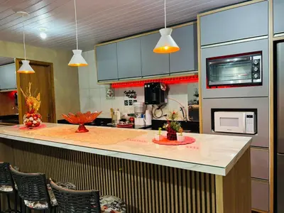 A cozinha ou kitchenette de Casa com 3 Dormitórios em Zimbros
